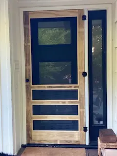 Installed natural Accoya screen door with shallow horizontal millwork