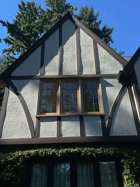 Historic Tudor-style Portland home with custom wood windows