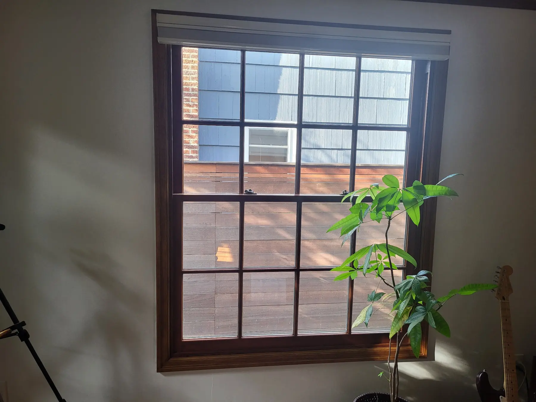 Installed custom divided-lite wood window